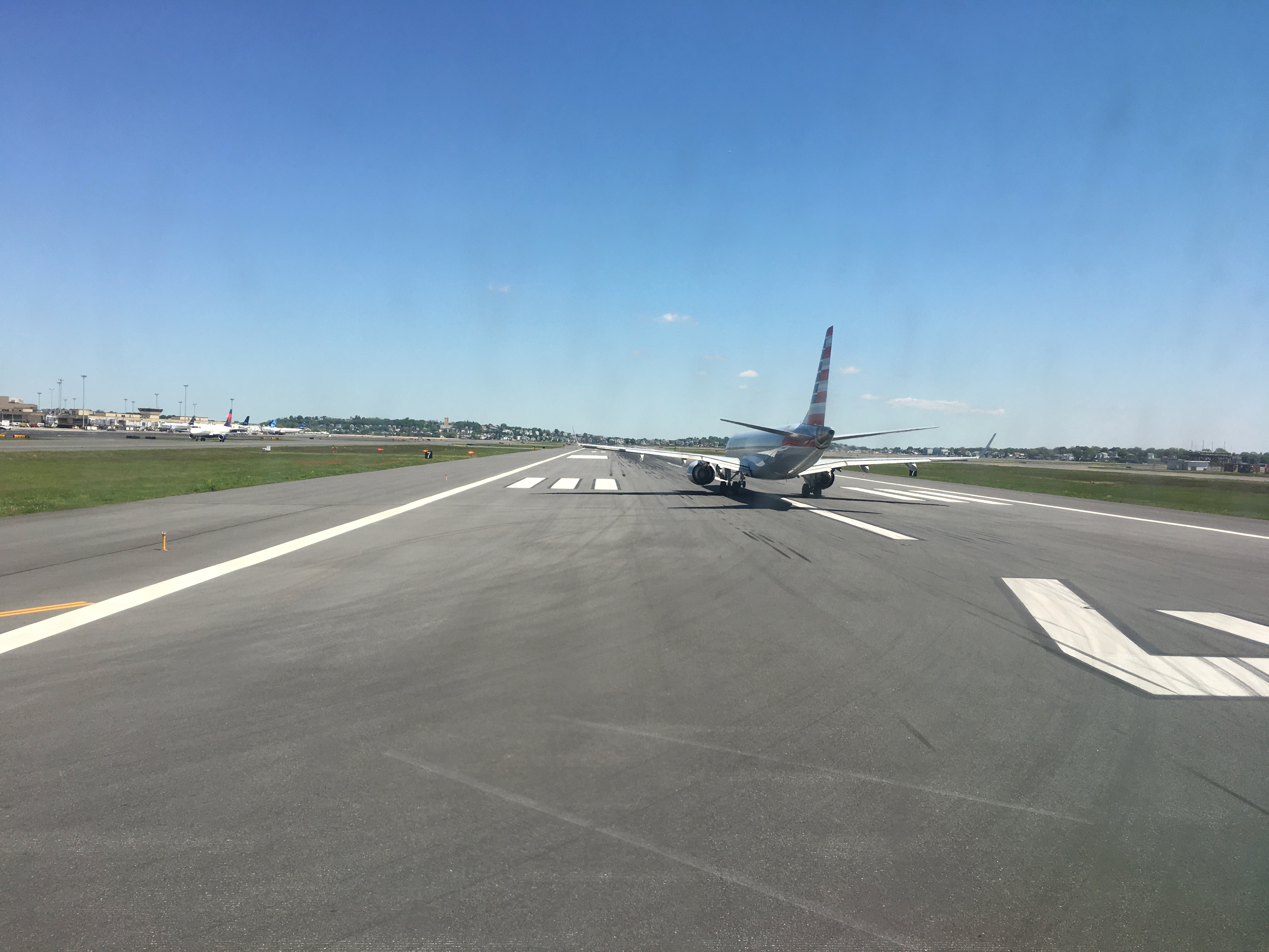 American Airlines plane lines up for takeoff on 4R at BOS